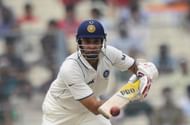 Indian cricketer V.V.S. Laxman plays a shot
